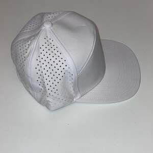 White Laser Perforated 7-Panel Performance Snapback Hat